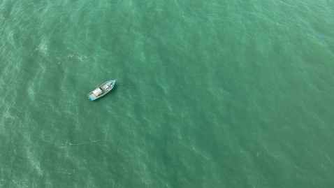 boat on calm body of water